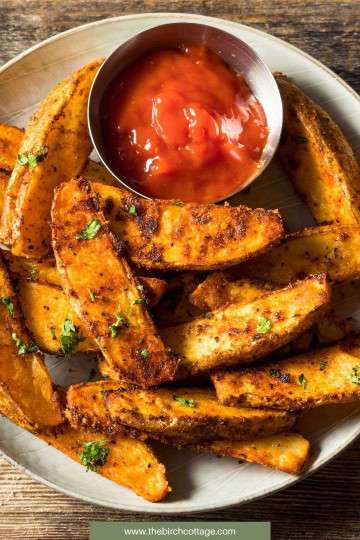 Learn the secret to making Crispy Seasoned Baked Potato Wedges every single time with this crowd pleaser recipe!